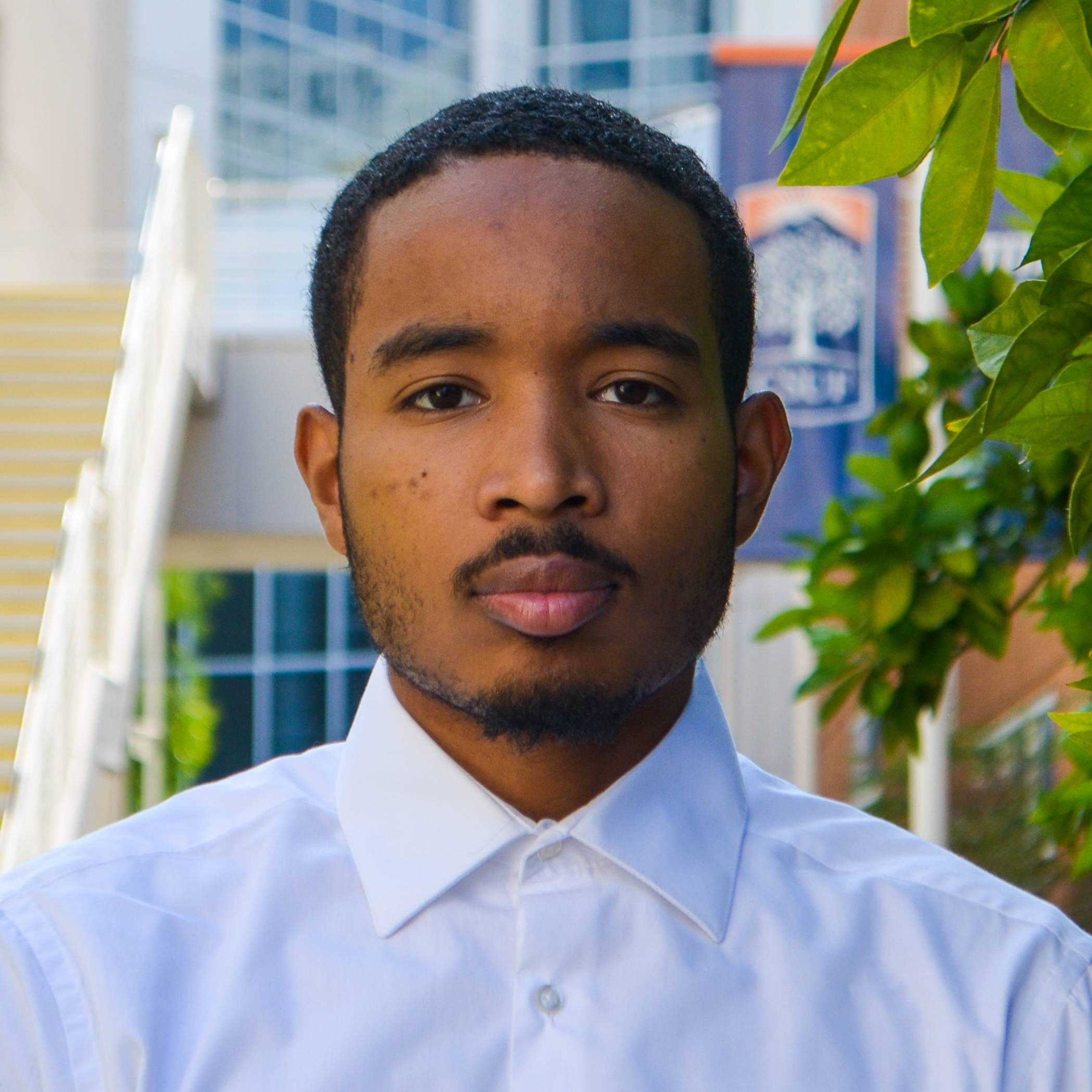 Professional headshot of Student Assistant Tre