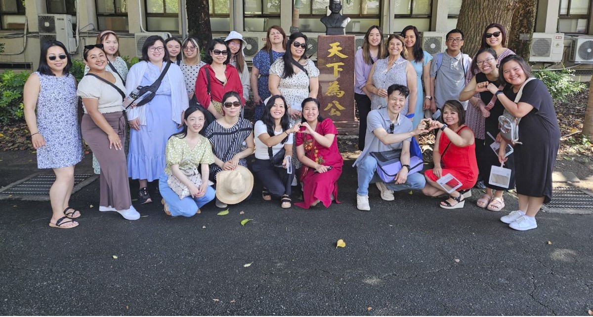 Teachers pose for a picture at a Taiwan school.