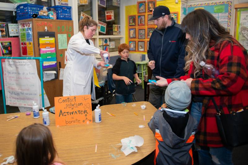 CSUF students doing a demo for elementary students