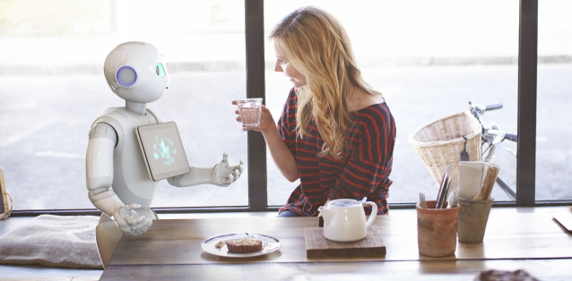 Woman with robot valet Pepper